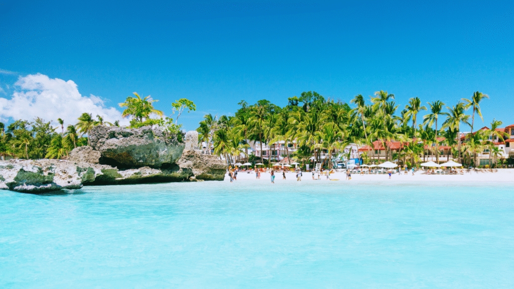 Powdery white sand and crystal-clear turquoise waters at Boracay White Beach, Philippines – a top travel spot among the Top 10 Asian Beaches

